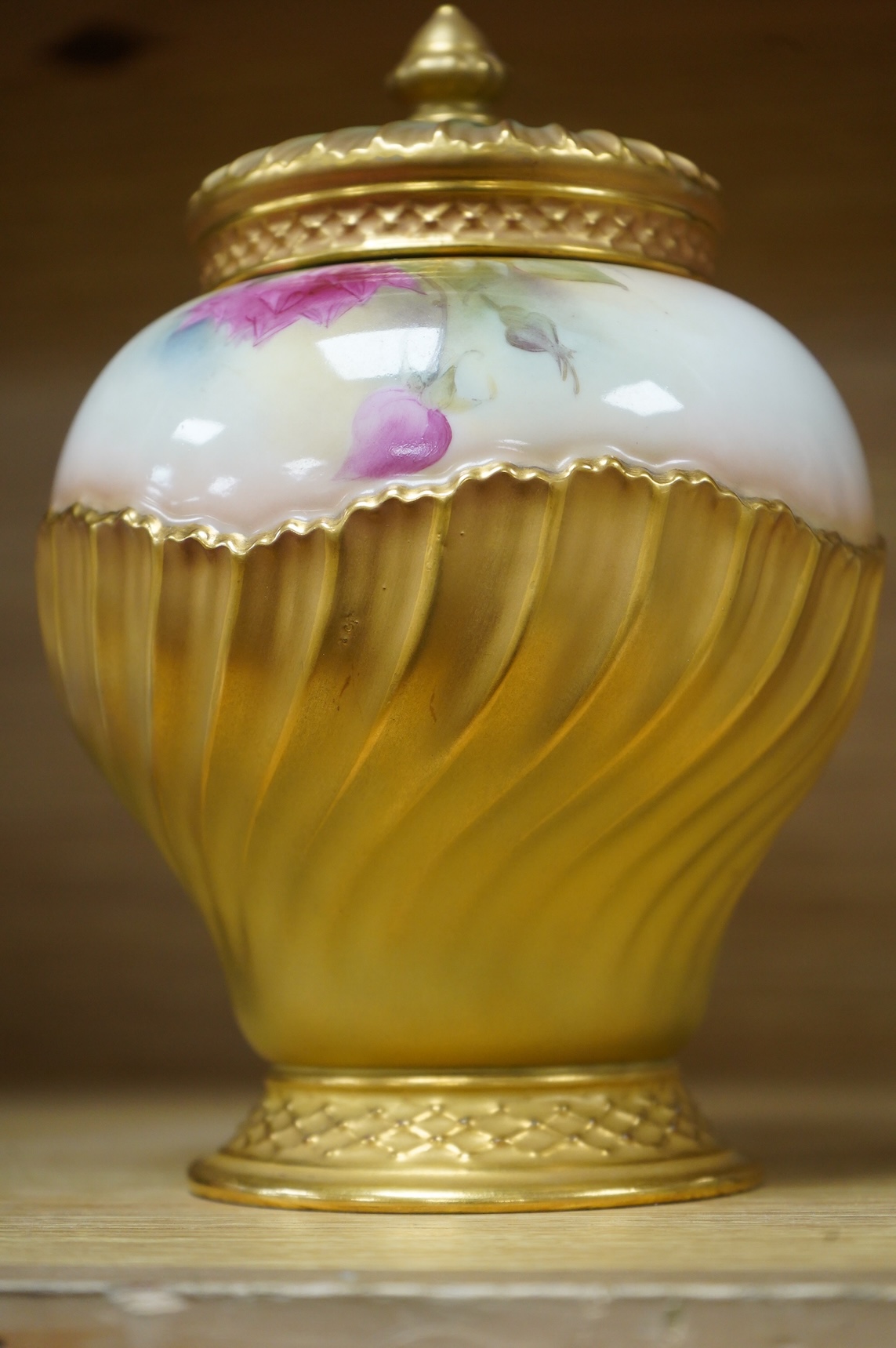 A Worcester pot pourri, cover and liner, signed E.M. Fildes, 20cm high